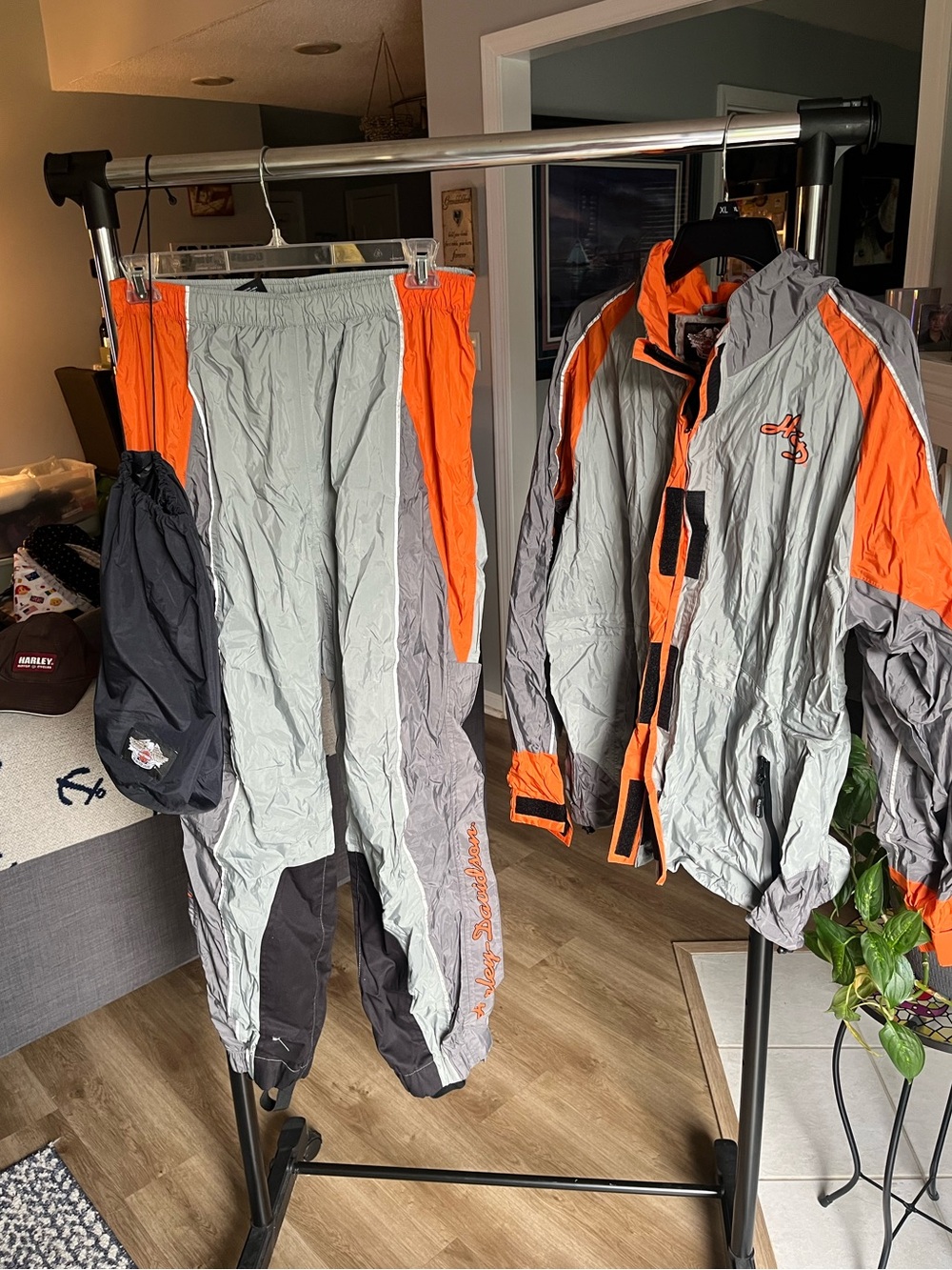 Women’s full riding Harley Davidson hooded rain suit with carrying pouch.